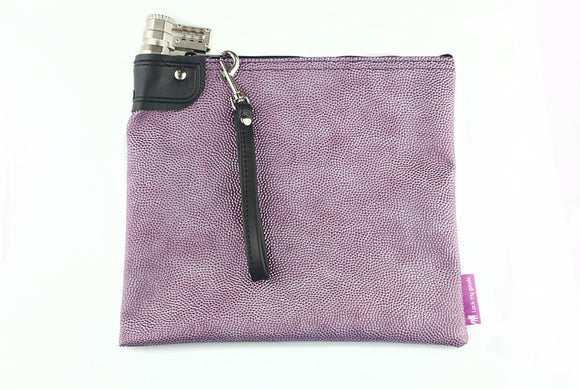 Beaded purple, rose colored money bag with combination lock and wrist strap.