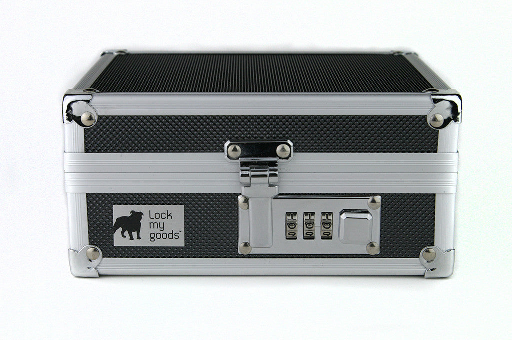 Locking medication case with prescription drugs. Child resistant packaging for cannabis, with combination lock.  Locking travel case.