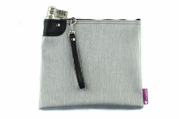 Silver, vinyl locking money bag with a combination key lock, and black wrist strap. 