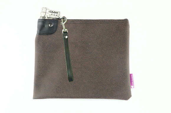 Faux leather, brown and cheetah print, locking money bag, with combination key lock. 