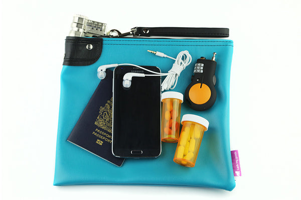 Teal, child resistant packaging demonstrated with locking medication bag or travel purse. Combination lock, shown locking passport and medication. 