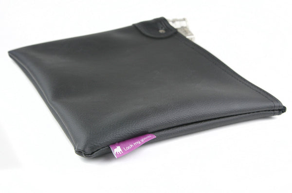 Basic black bag, diagonal view showing seam and label