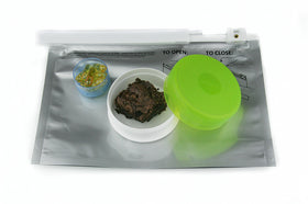 Child resistant packaging for cannabis. Stink Sack child resistant ziplock shown with cannabis edibles and oil capsules. 