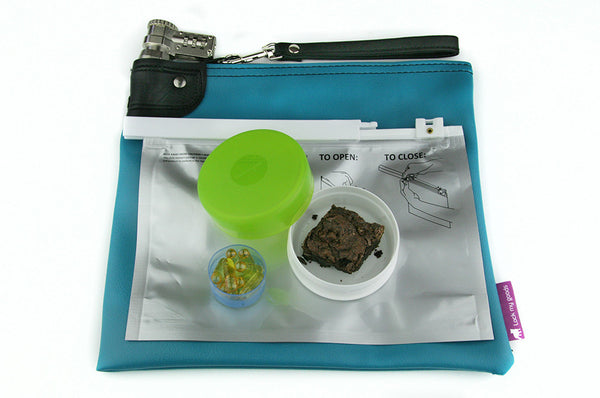 Teal blue, locking money bag with combination lock, shown with Stink Sack child resistant ziplock bag, marijuana edibles, and cannabis oil capsules. 