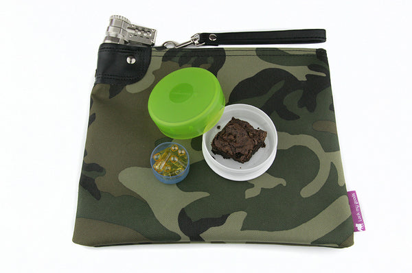 Camouflage medication bag shown with medical cannabis edible and capsules.  Child resistant packaging for cannabis. 